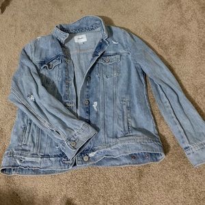Distressed blue jean jacket